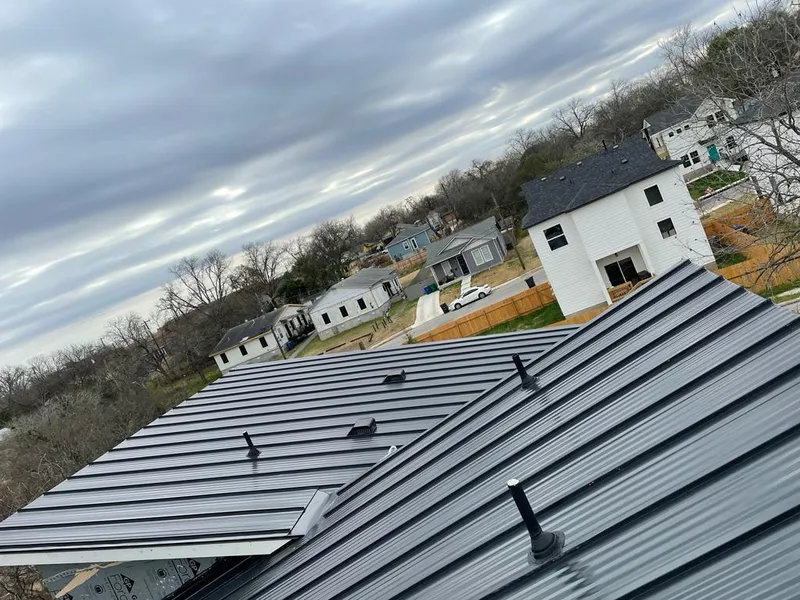 Standing seam metal roof panels with vents for Skylight Repair in Cliffside Park
